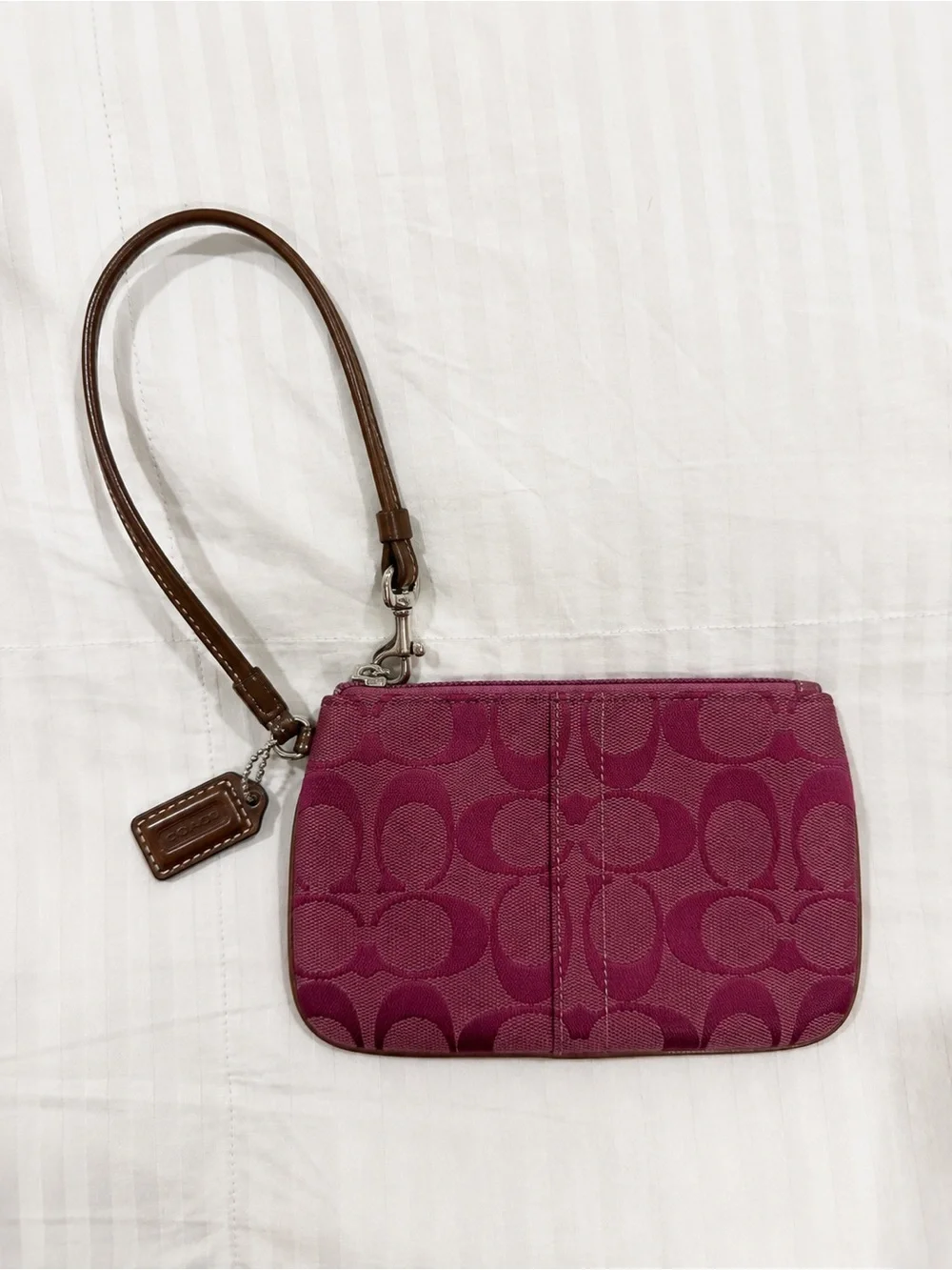Coach Signature C Magenta Wristlet with Brown Leather Strap